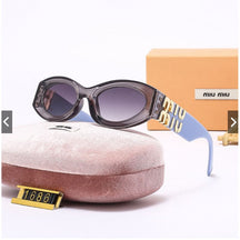 Miu Miu Fashion Oval Women's Sunglasses