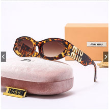 Miu Miu Fashion Oval Women's Sunglasses